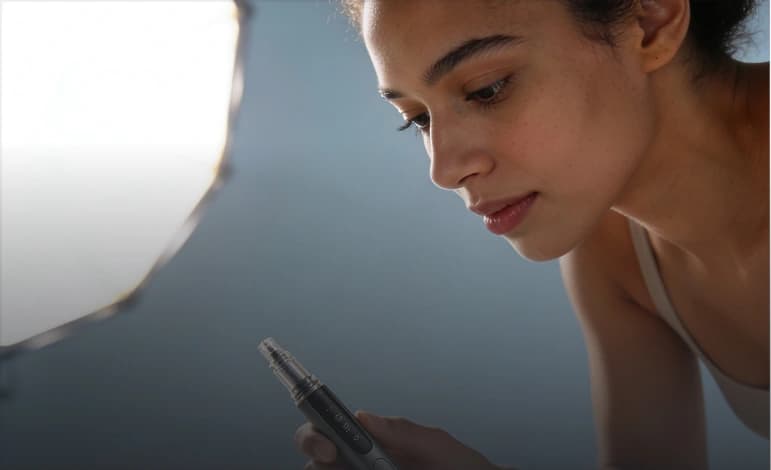 Patient looking at a GLP-1 injection pen